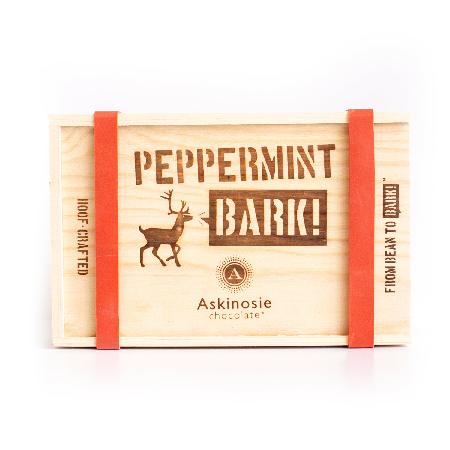 A wooden pine gift box branded with Peppermint Bark against a white background