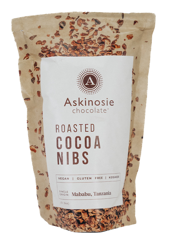 Pouch of Askinosie Chocolate roasted cocoa nibs on a white background