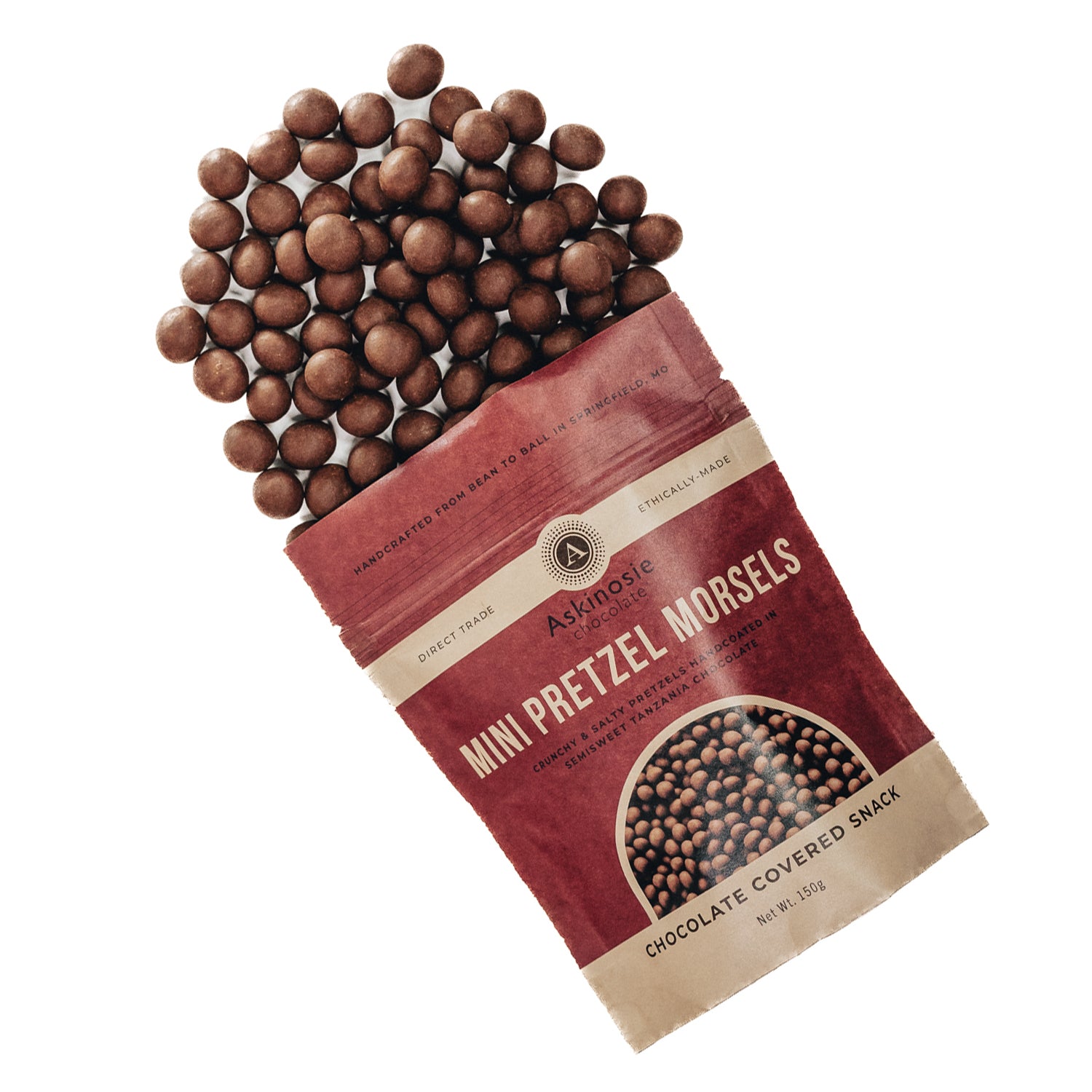 Chocolate Covered Pretzels spill out of the top of their maroon packaging.