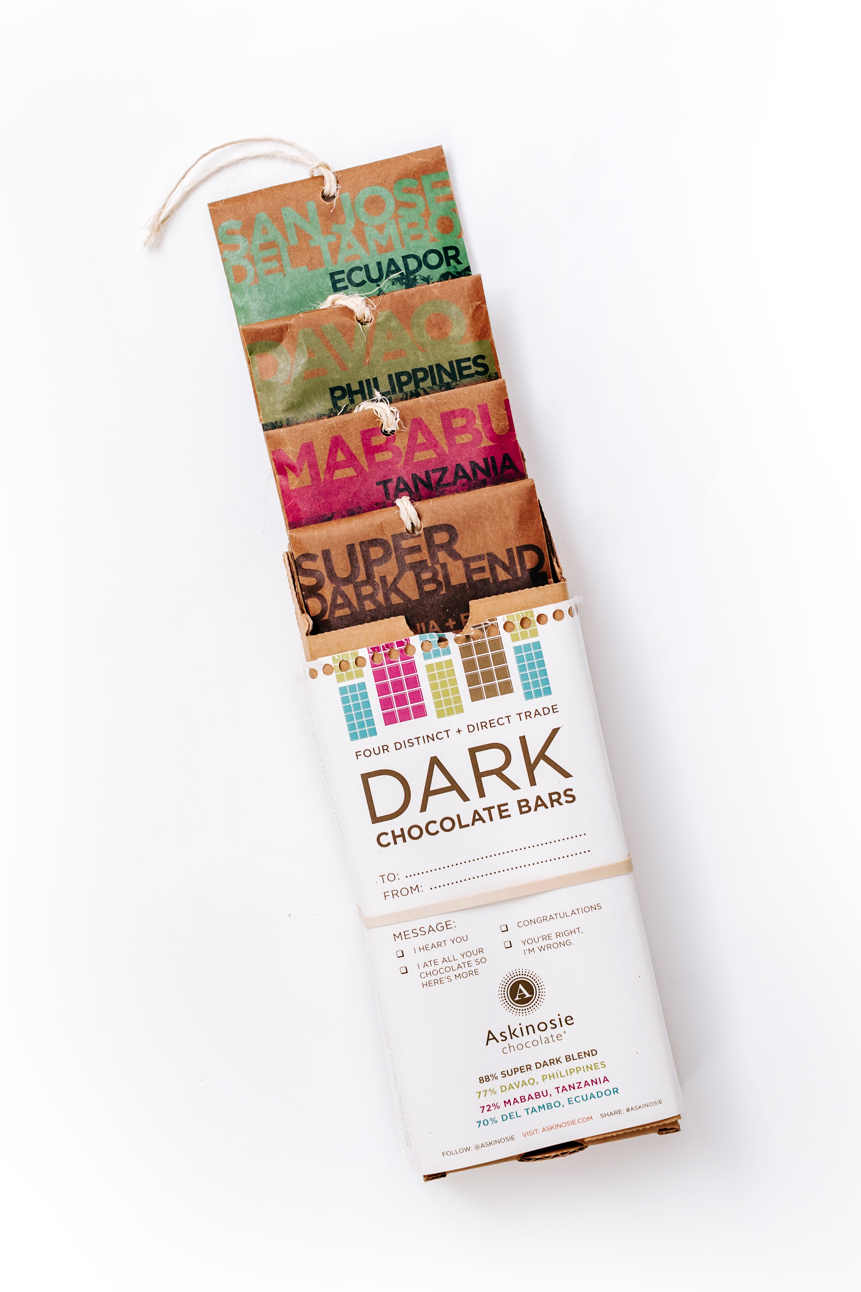 Askinosie Single Origin Dark Chocolate Four Bar Pack Gift Box Packaging with bars displayed from open box